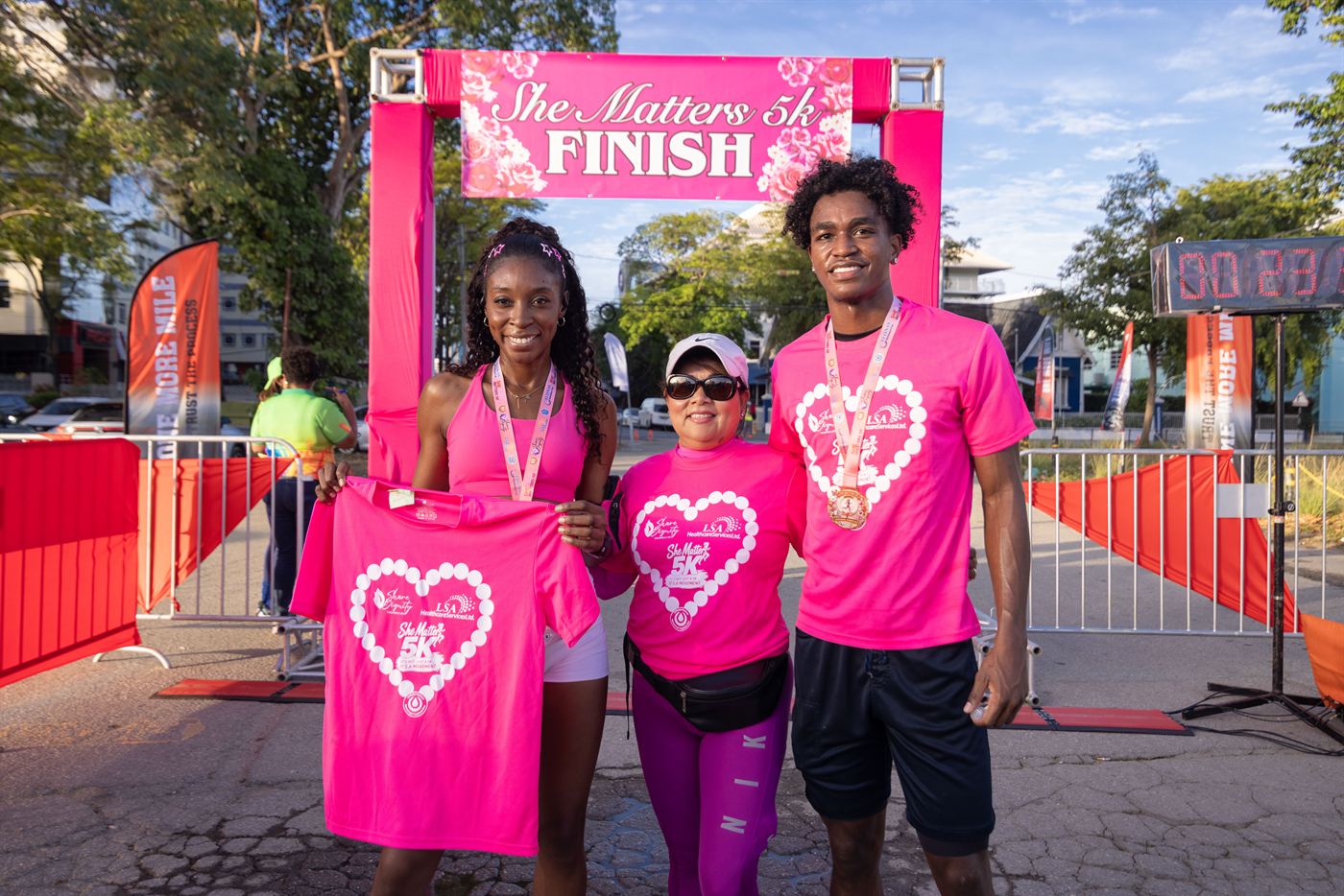 She Matters 5K race participants smiling